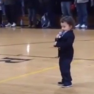 2-Year-Old Boy Takes To The Stage, Sings The National Anthem And Silence The Crowd