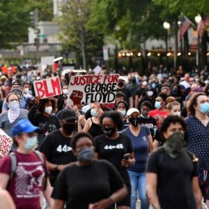A large crowd of protesters has gathered in Washington, D.C., voicing strong opposition to President Trump’s recent actions..