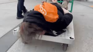 MUST-SEE: ICE Wheels Portland Protestor Away On A Cart